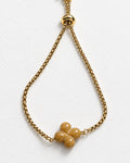 Clover Engraved Yellow Jade Slide Bracelet | Gold